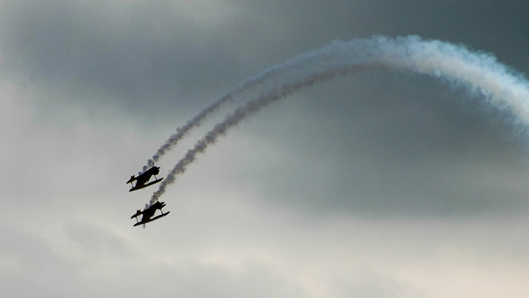 Two biplanes looping the loop at the Clacton Air Show