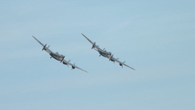 Two Lancaster bombers fly past at the Clacton Air Show