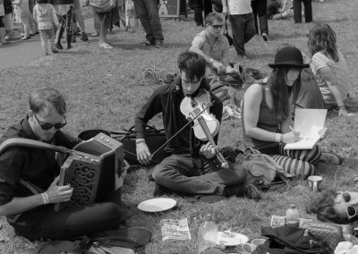 Young musicians practice on the green at Priddy Folk Festival