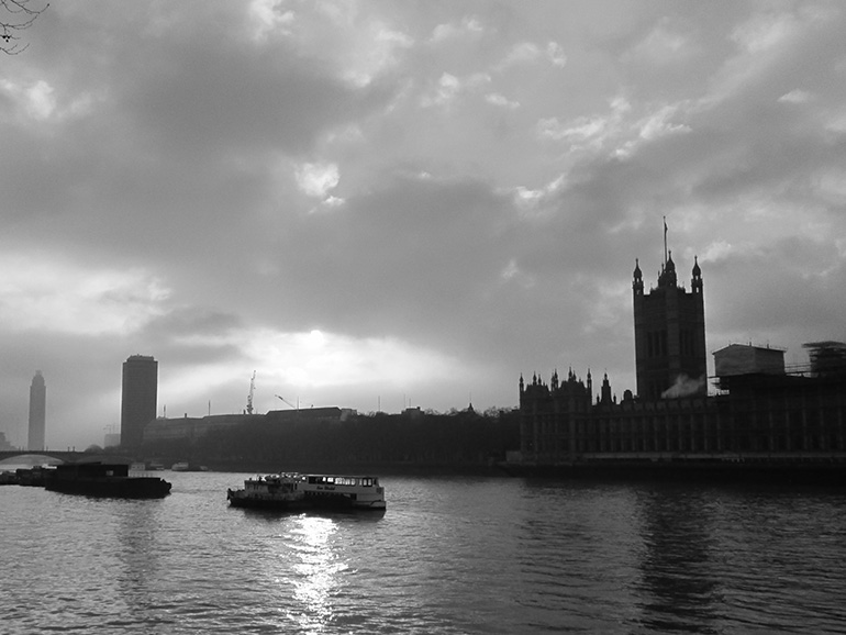 Sun setting behind the Houses of Parliament