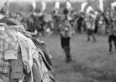 Morris dancers viewed over a shoulder at Horfield Wassail