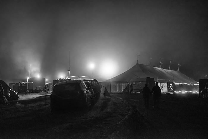 Outside Swildons marqee at Priddy Folk festival seen during a misty night