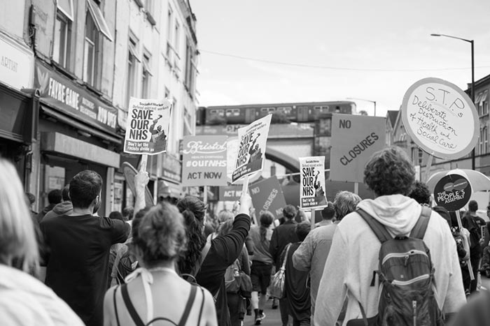 Save our NHS march approaches the Arches on Gloucester Road