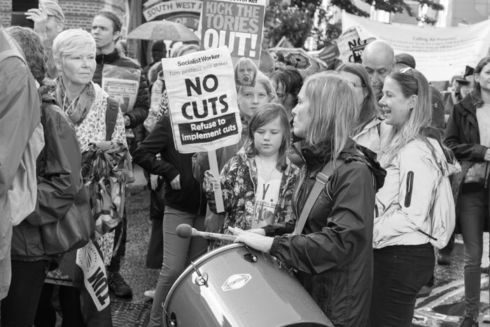 Drummer in the crowd on Bristol's anti-austerity march