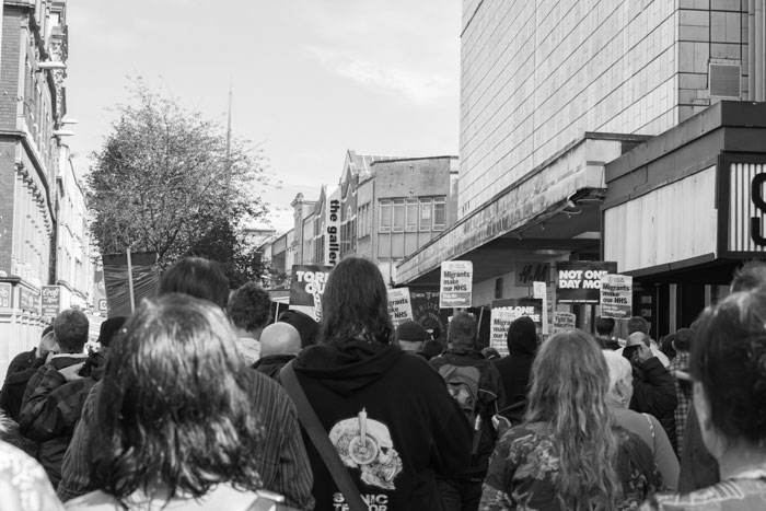 Anti-austerity march approaches Broadmead shopping centre in Bristol