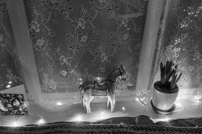 Christmas lights on a window sill